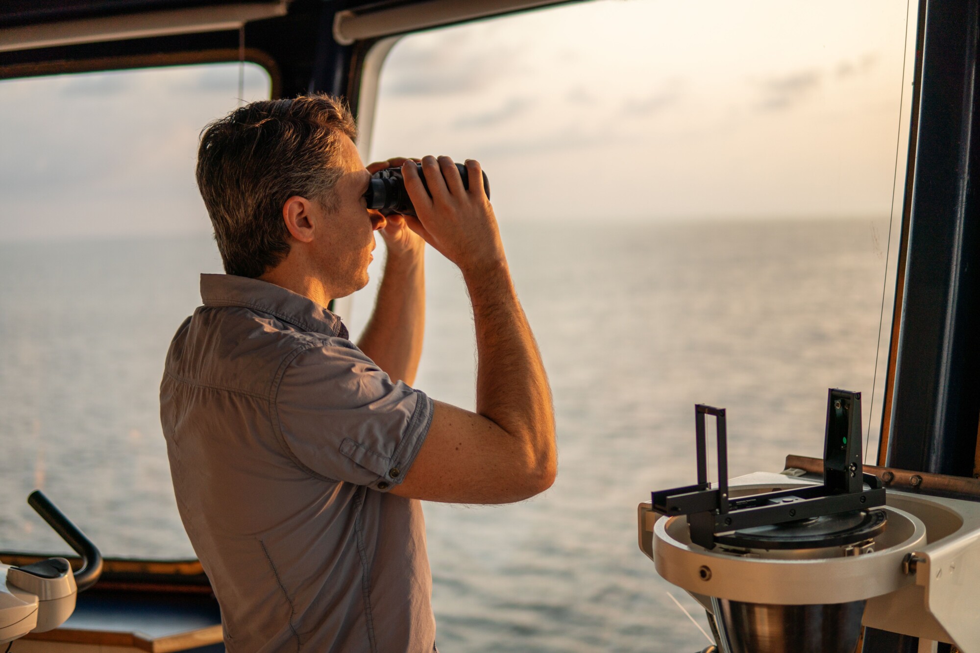A navigation officer looks ahead across the ocean, illustrating this article on financial planning in response to the Autumn Budget 2025